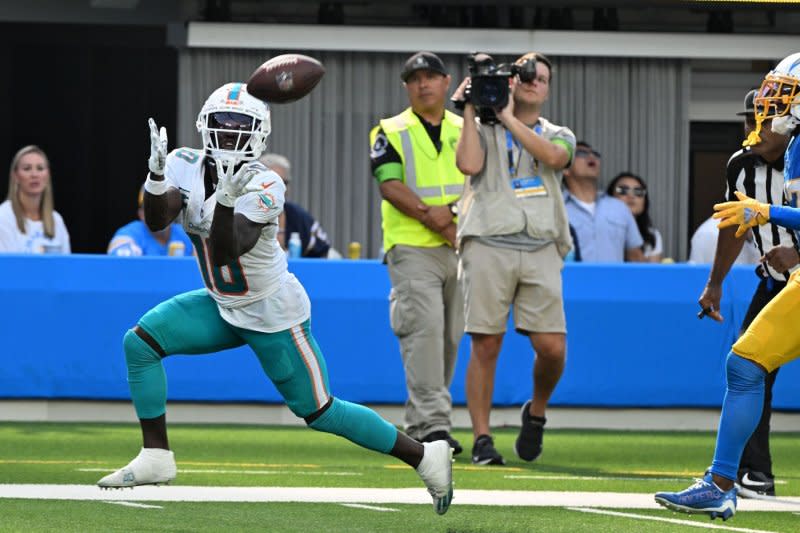 Wide receiver Tyreek Hill (L) and the Miami Dolphins played the Los Angeles Chargers on Sunday on the synthetic turf field at SoFi Stadium in Inglewood, Calif. Photo by Jon SooHoo/UPI