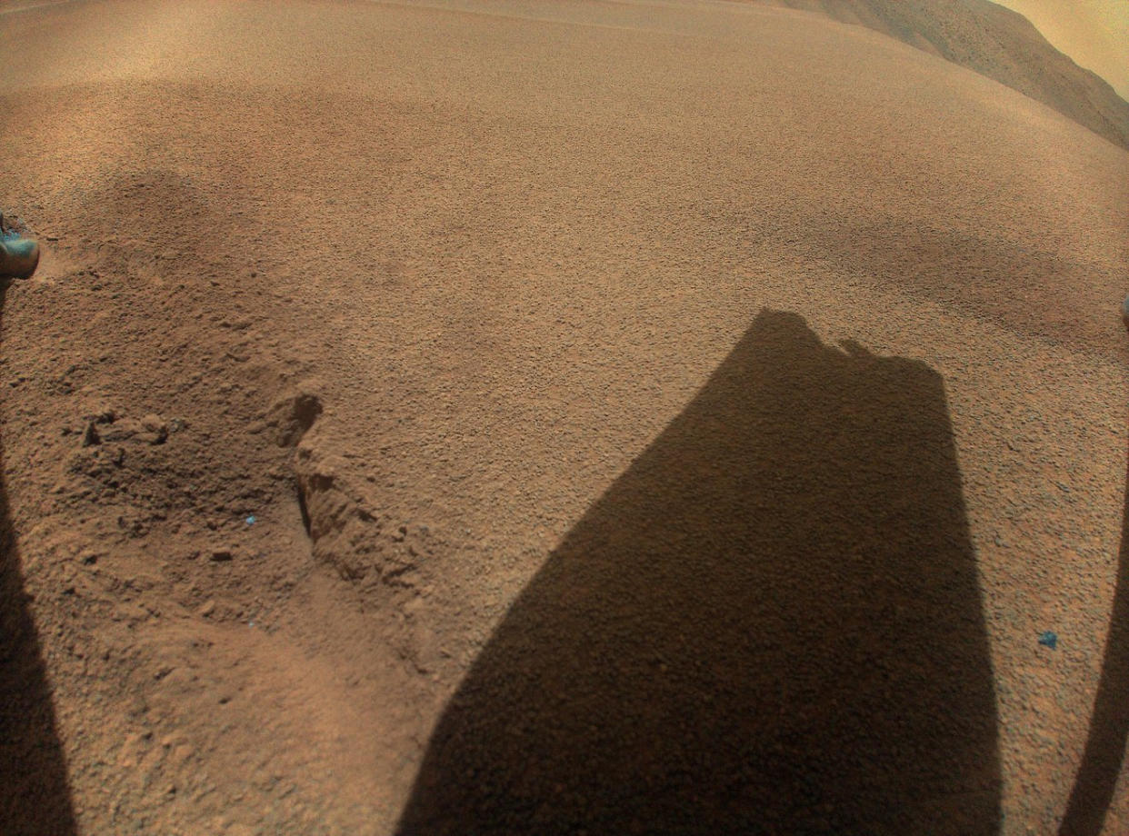  A shadow of a broken helicopter rotor on Mars. 