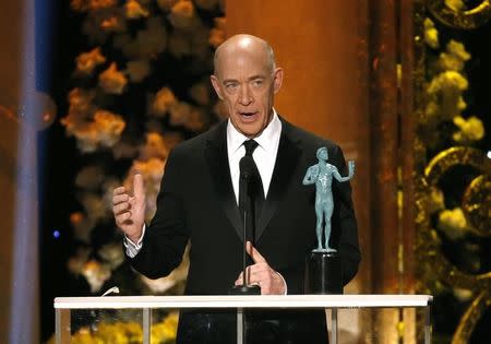 J.K. Simmons accepts the award for Outstanding Performance by a Male Actor in a Supporting Role for the film "Whiplash" at the 21st annual Screen Actors Guild Awards in Los Angeles, California January 25, 2015. REUTERS/Mario Anzuoni