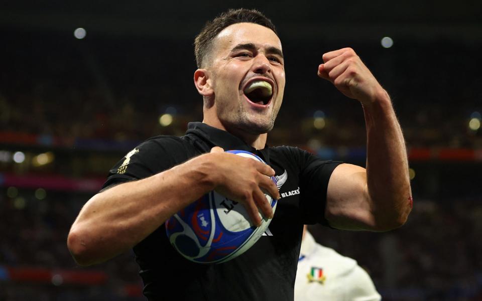 New Zealand's Will Jordan celebrates scoring their twelfth try