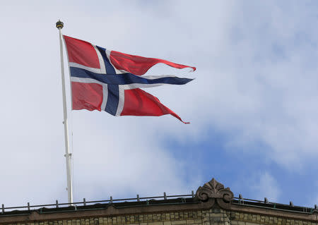 A Norwegian flag flutters over building in Oslo, Norway May 31, 2017. REUTERS/Ints Kalnins