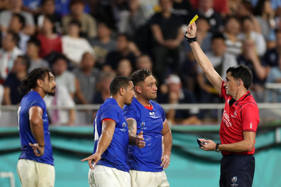 KOBE, JAPAN - SEPTEMBER 30: Ed Fidow of Samoa is shown a yellow card by referee Pascal Gauzere during the Rugby World Cup 2019 Group A game between Scotland and Samoa at Kobe Misaki Stadium on September 30, 2019 in Kobe, Hyogo, Japan. (Photo by Mike Hewitt/Getty Images)