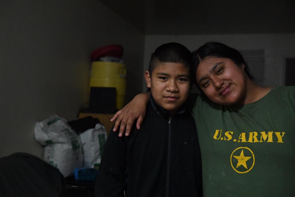 Aldo Salvador, a la izquierda, y su hermana Resi aparecen juntos en esta foto, en su departamento de dos dormitorios en el lado norte de Salinas, el sábado 16 de mayo de 2020.