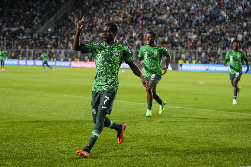 Nigeria's Rilwanu Haliru Sarki celebrates scoring his side's 2nd goal against Argentina during a FIFA U-20 World Cup round of 16 soccer match at the Bicentenario stadium in San Juan, Argentina, Wednesday, May 31, 2023. (AP Photo/Ricardo Mazalan)