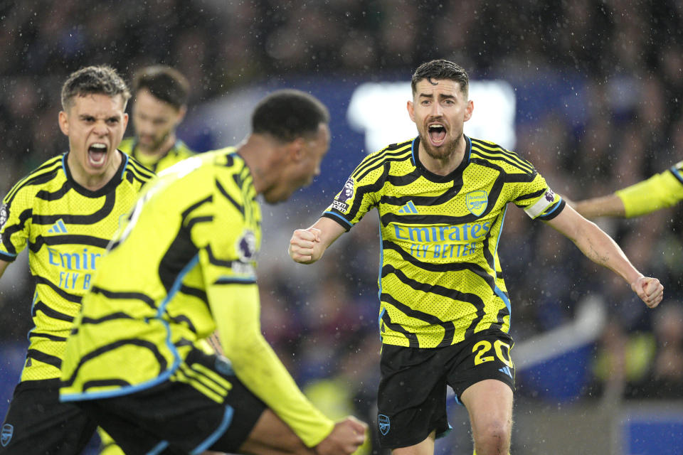 Arsenal players react during the English Premier League soccer match between Brighton and Hove Albion and Arsenal at the American Express Community Stadium in Brighton, England, Saturday, April 6, 2024. (AP Photo/Dave Shopland)