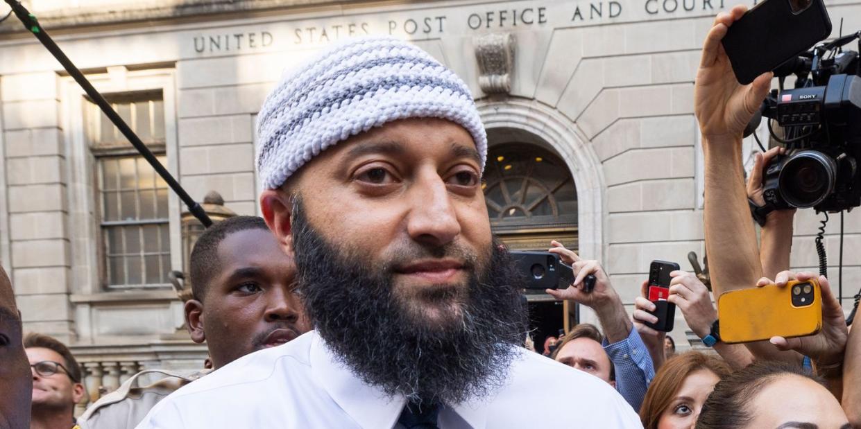 serial podcast subject adnan syed walks out the the baltimore circuit court after a judge vacated his murder conviction