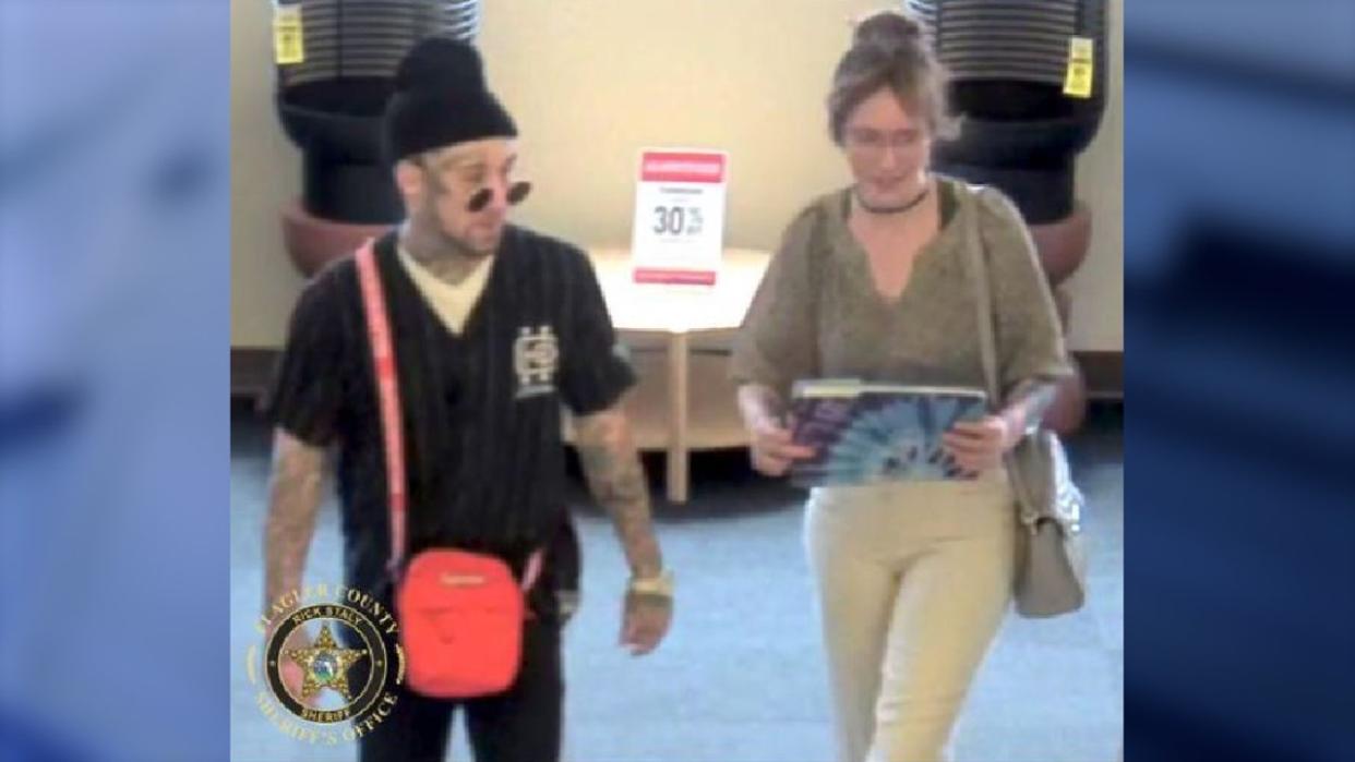 <div>Photo shows couple accused of stealing several items from a Florida Hobby Lobby | Photo credit: Flagler County Sheriffs Office</div>