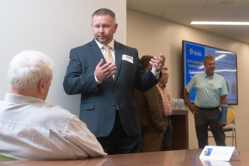 Topeka city manager candidate Mike Harmon answers questions from community members during Tuesday's public meet and greet. Harmon is a former city administrator for Fairfield, Iowa, Spearfish, S.D., and Crystal Lake, Minn.