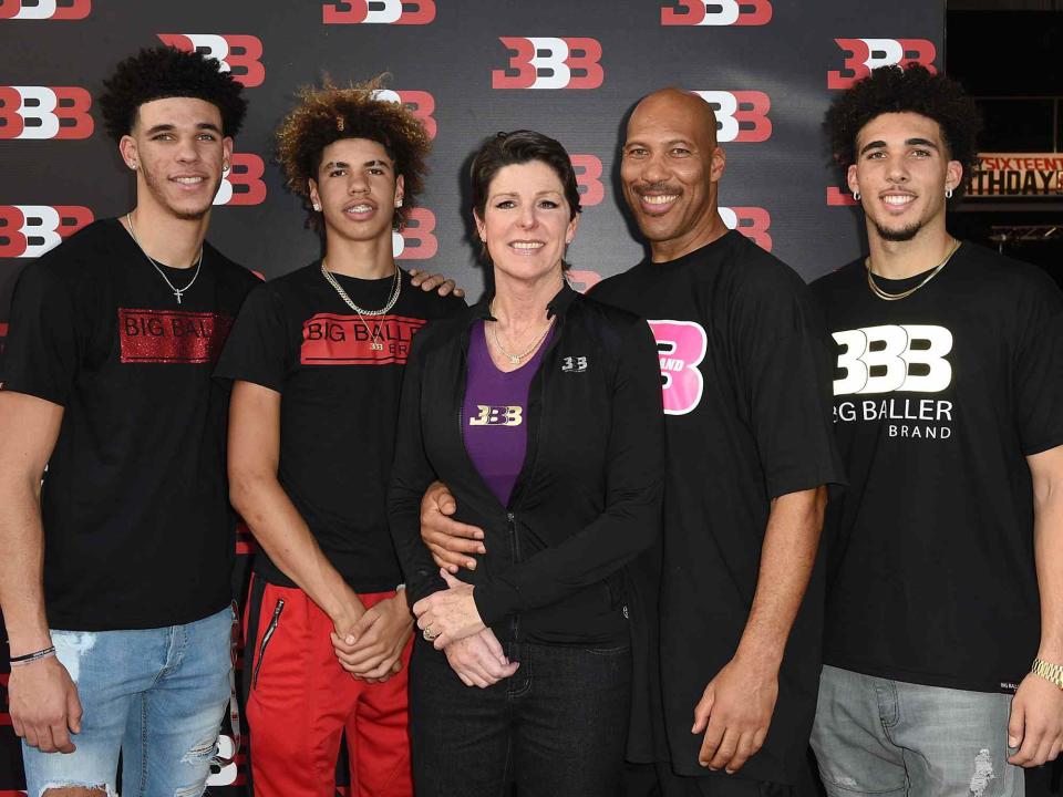 Joshua Blanchard/Getty  Lonzo Ball, LaMelo Ball, Tina Ball, LaVar Ball and LiAngelo Ball attend Melo Ball