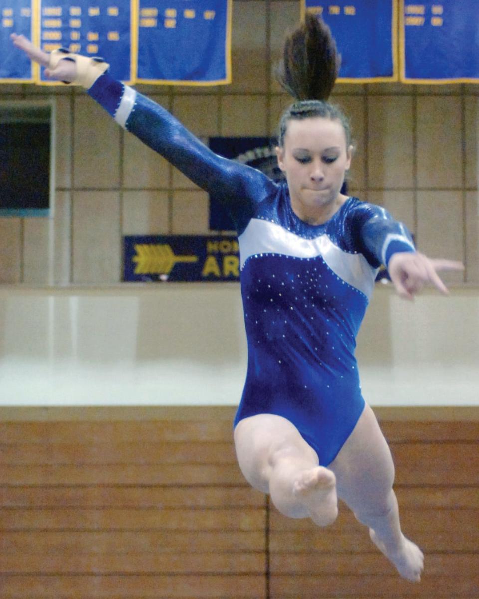 Caitlin Mack was a standout gymnast for Watertown High School from 2005-2010 and later coached Deuel High School to four-straight Class A titles from 2018-21.