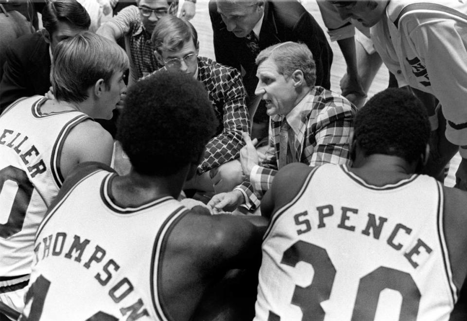 Wolfpack coach Norman Sloan lays out strategy during a time-out in the 1974 ACC Tournament game against Maryland.