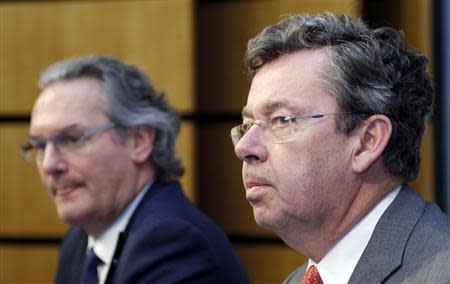 Belgian Minister for Public Enterprises and Development Cooperation Jean-Pascal Labille (L) and Didier Bellens, chief executive officer of Belgium's telecom operator Belgacom, hold a joint news conference at Belgacom headquarters in Brussels September 16, 2013. REUTERS/Yves Herman