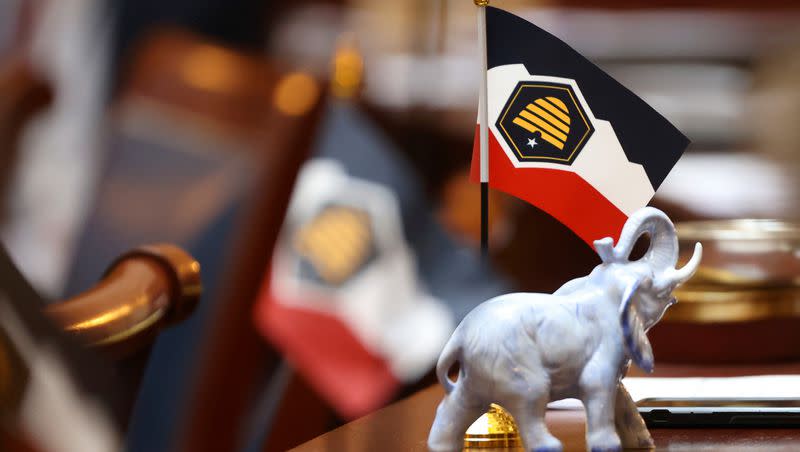 A small replica of the proposed new Utah state flags are displayed on lawmakers’ desks at the Capitol in Salt Lake City, on Feb. 28. Gov. Spencer Cox signed the bill Tuesday that allows for the state flag to be adopted.