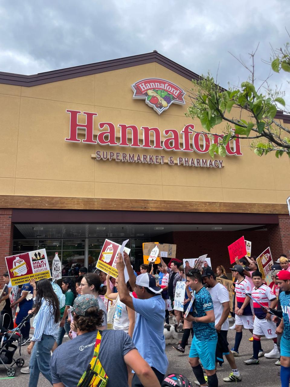 Migrant Justice community members protested outside of Hannaford asking for accountability down the dairy supply chain.