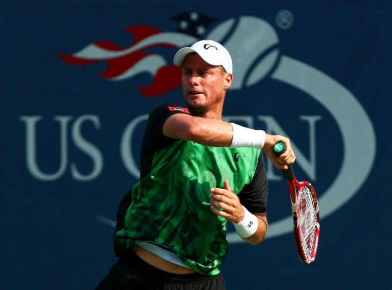 Lleyton Hewitt of Australia returns a shot to Aleksandr Nedovyesov of Kazakhstan during the US Open on September 1, 2015 in New York