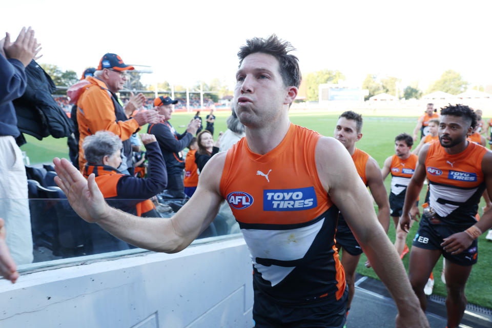 CANBERRA, AUSTRALIA - APRIL 13: Toby Greene of the Giants walks from the field after victory during the round five AFL match between Greater Western Sydney Giants and St Kilda Saints at Manuka Oval, on April 13, 2024, in Canberra, Australia. (Photo by Mark Metcalfe/AFL Photos/Getty Images)