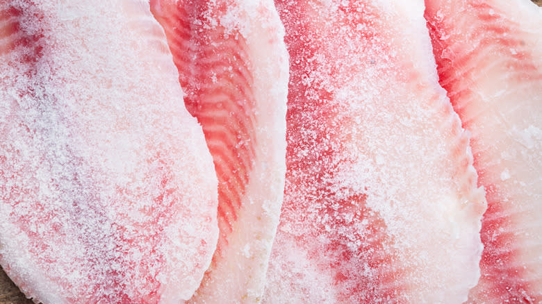 frozen tilapia fillets in pile