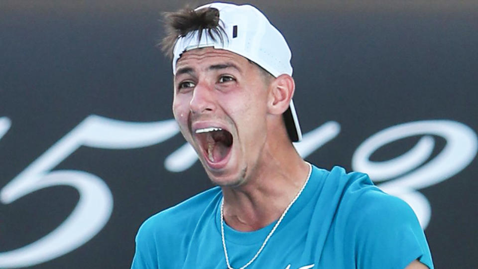 Australia's Alexei Popyrin celebrates his victory against Belgium's David Goffin in the first round of the Australian Open. (Photo by BRANDON MALONE/AFP via Getty Images)
