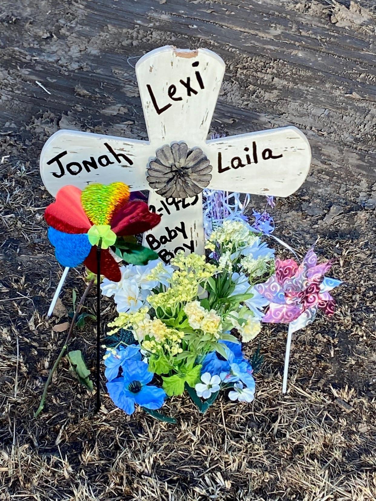 A memorial along Delaware County Road 600 West, south of Ind. 67, marks the area where three members of a Muncie family died in a traffic accident on Feb. 19, 2023.