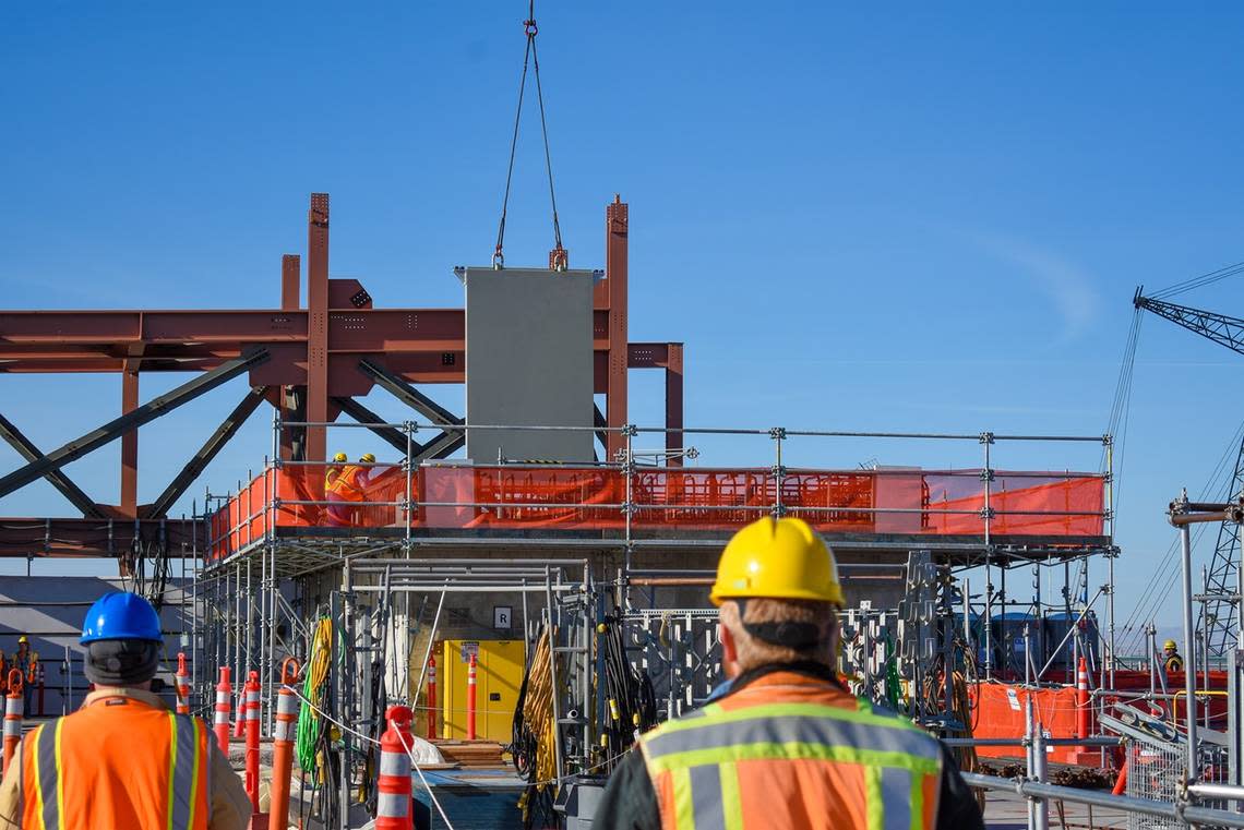 Some limited construction work is being done at the Hanford vitrification plant’s High Level Waste Facility, including lifting 16-ton carbon steel shield doors into the building