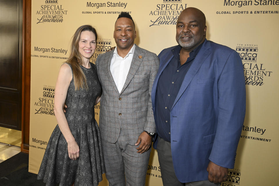 Hilary Swank, Deon Taylor and Gil Robertson IV at the AAFCA Special Achievement Awards Luncheon held at the Los Angeles Athletic Club on March 3, 2024 in Los Angeles, California.