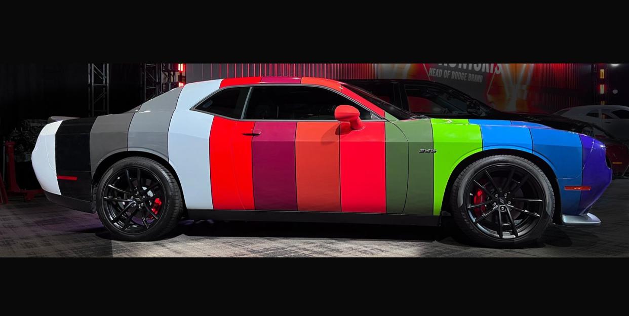 dodge challenger with hi impact color wrap that includes all 14 of the 2023 muscle car's available hues