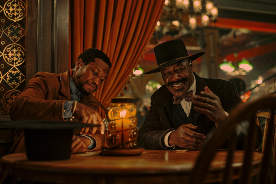 From left, Jonathan Majors and Delroy Lindo in “The Harder They Fall.” - Credit: David Lee/Netflix