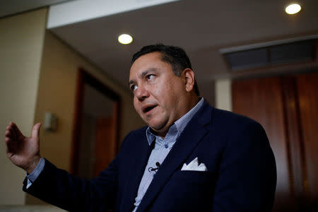 Venezuelan evangelical pastor and presidential pre-candidate Javier Bertucci speaks during an interview with Reuters in Caracas, Venezuela February 21, 2018. REUTERS/Marco Bello