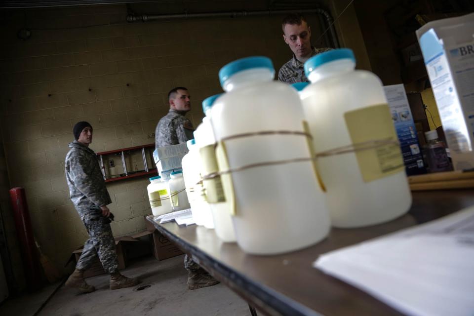 Water analysis test kits sit for Flint residents to pick up for lead testing in their drinking water on Monday, Jan. 18, 2016, at Flint Fire Department Station 1 in downtown Flint.