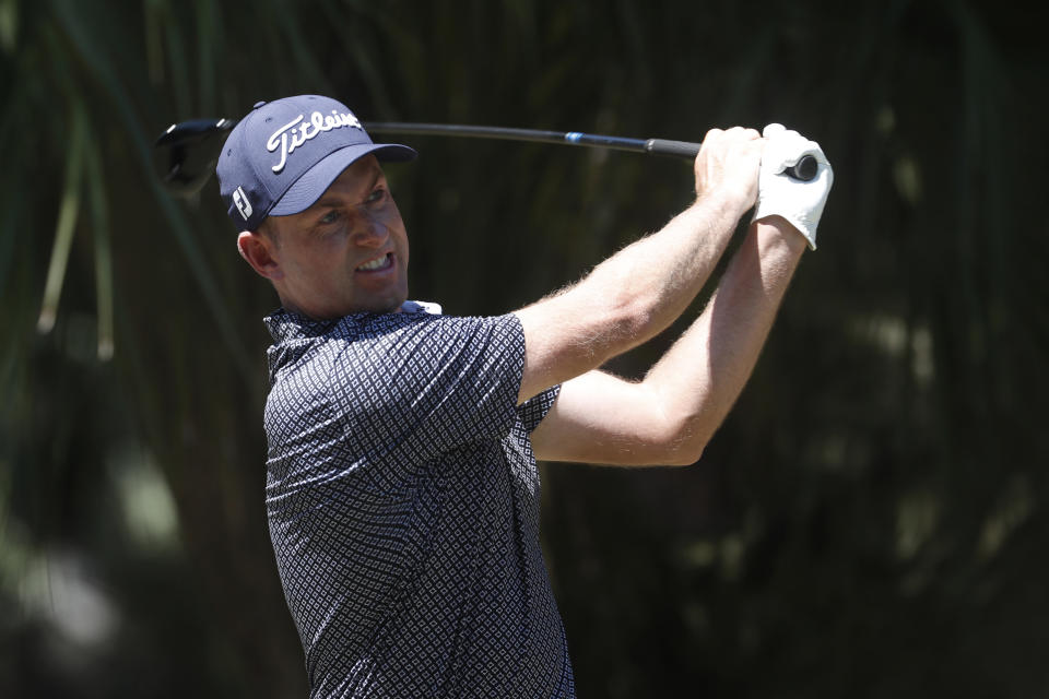 Webb Simpson hits from the 11th tee, during the first round of the RBC Heritage golf tournament, Thursday, June 18, 2020, in Hilton Head Island, S.C. (AP Photo/Gerry Broome)