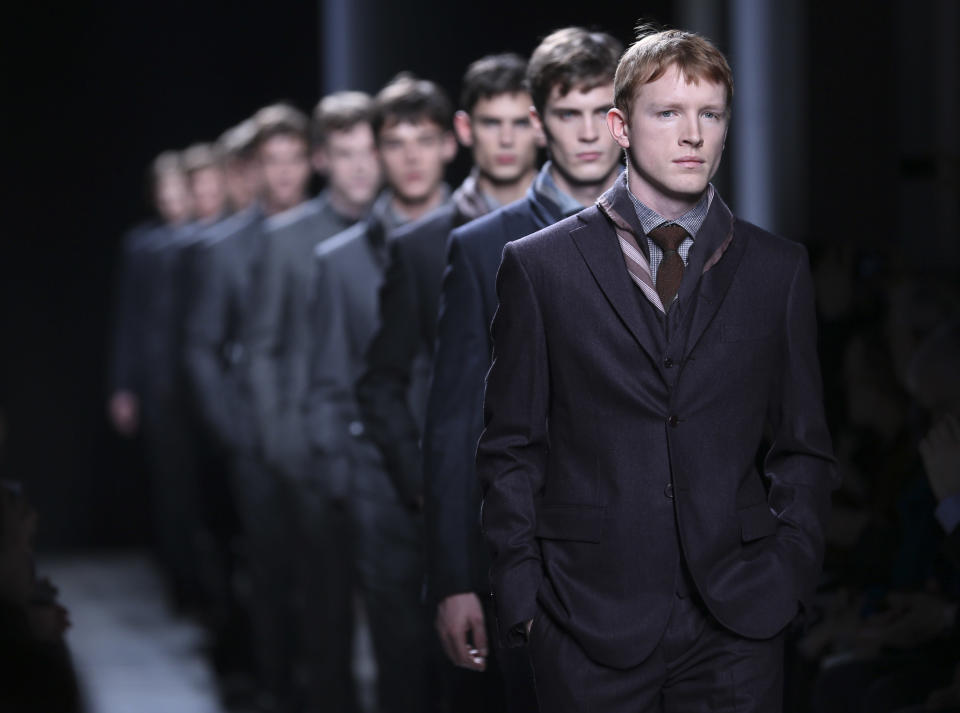 Models wear creations for Bottega Veneta men's Fall-Winter 2013-14 collection, part of the Milan Fashion Week, unveiled in Milan, Italy, Sunday, Jan. 13, 2013. (AP Photo/Luca Bruno)