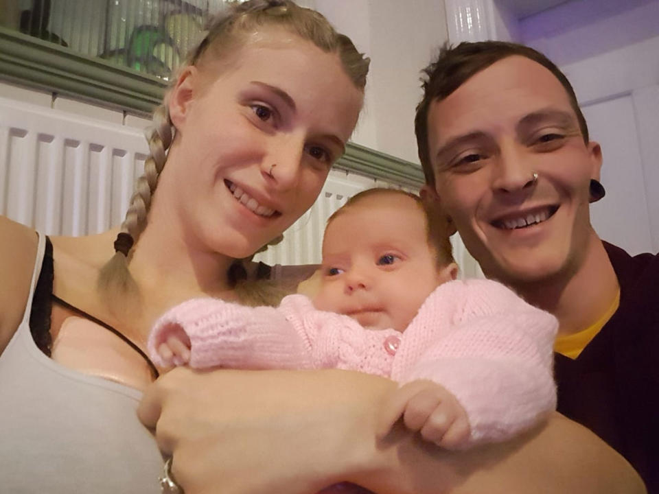 Parents Sophie and Thomas Hobbs said their baby Eliza nearly died from a chest infection caused by a stranger kissing her. Source: Caters