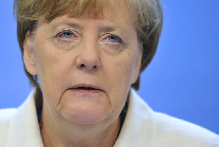 German Chancellor Angela Merkel warned that Greece and its European partners still face a challenging road ahead to finalise a third bailout for Athens
