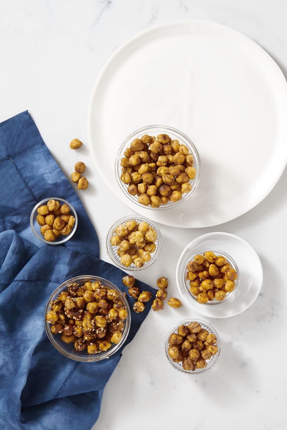 <p>Make crispy chickpeas in the air fryer instead of the oven for a protein-packed snack.</p><p><em><a href="https://www.goodhousekeeping.com/food-recipes/a40814/chickpea-nuts-recipe/" rel="nofollow noopener" target="_blank" data-ylk="slk:Get the recipe for Air Fryer Chickpea "Nuts" »;elm:context_link;itc:0;sec:content-canvas" class="link ">Get the recipe for Air Fryer Chickpea "Nuts" »</a></em></p>