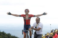 Belgium's Dylan Teuns celebrates as he crosses the finish line to win the sixth stage of the Tour de France cycling race over 160 kilometers (100 miles) with start in Mulhouse and finish in La Planche des Belles Filles, France, Thursday, July 11, 2019. (AP Photo/Thibault Camus)