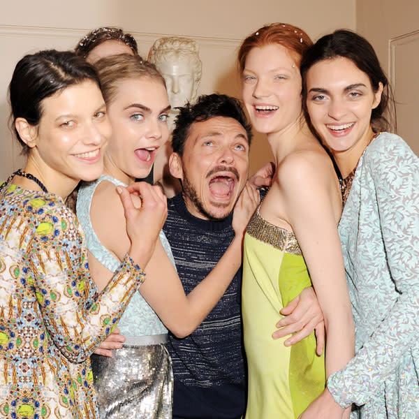 Cara Delevingne jokes with Matthew Williamson backstage at his AW13 show © Getty