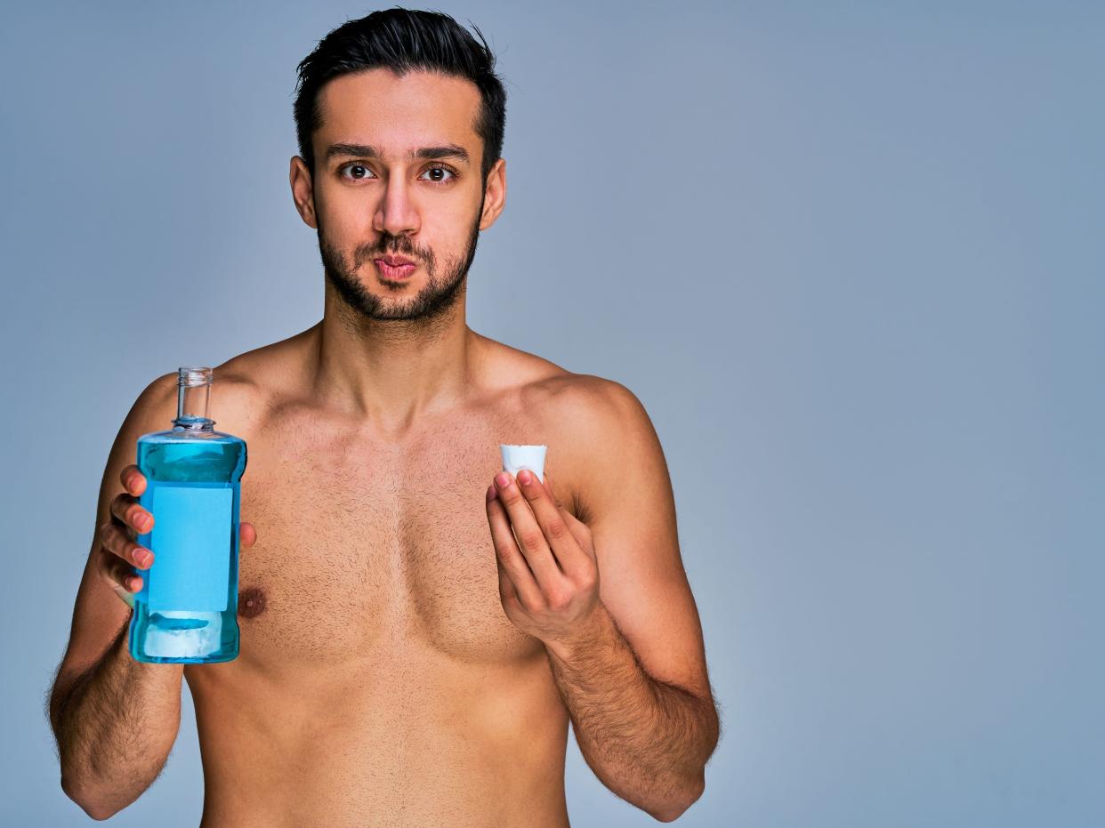 shirtless guy mouthwash