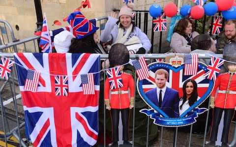 Royal fans awake at first light having spent the night outside of Windsor Castle - Credit: Paul Grover