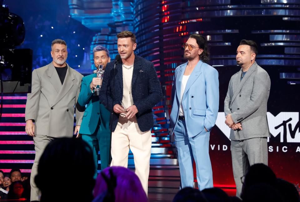 Joey Fatone (left), Lance Bass, Justin Timberlake, JC Chasez and Chris Kirkpatrick of NSYNC reunite at the 2023 MTV Video Music Awards on Sept. 12, 2023.