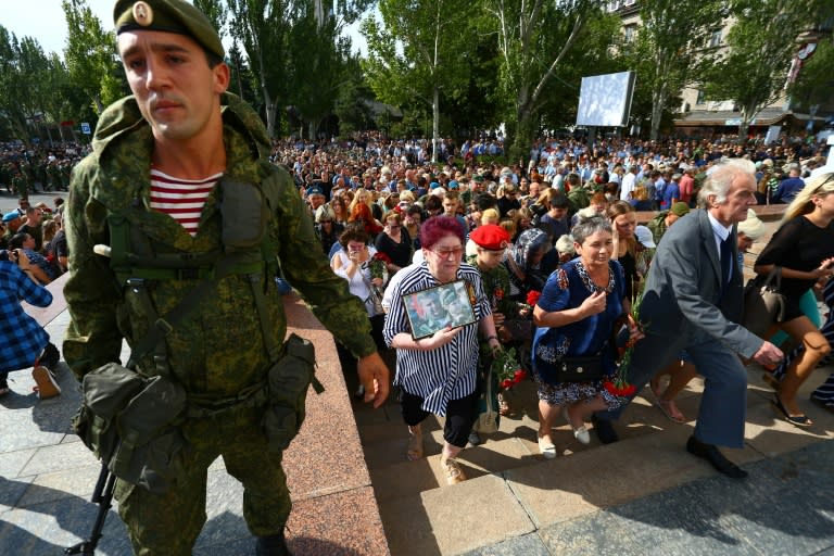 Mourners attend the funeral ceremony of Alexander Zakharchenko, leader of the self-proclaimed Donetsk People's Republic (DNR), in Donetsk, eastern Ukraine on September 2, 2018