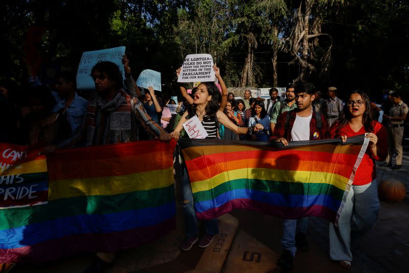 Students and supporters of Students' Federation of India (SFI) take part in an LGBT+ Pride vigil at North Campus in New Delhi