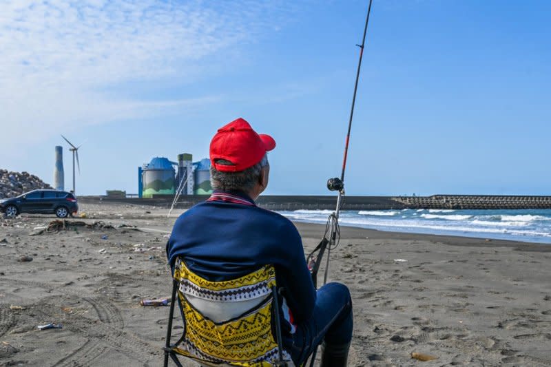 A fisherman waits for a nibble at Bali, one of Taiwan's "red beaches" under the threat of a Chinese amphibious invasion. Photo by Thomas Maresca/UPI