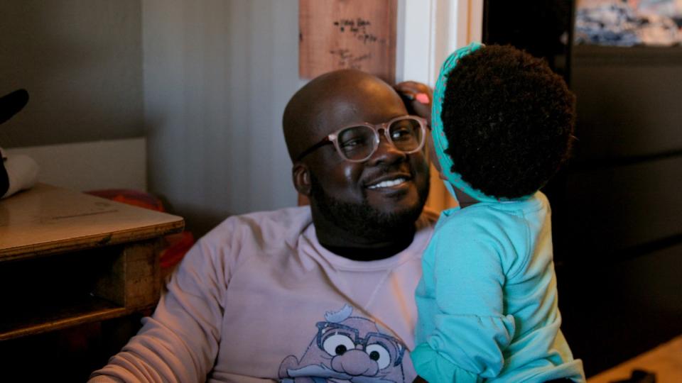 Glen Henry and his daughter in the documentary "Dads."