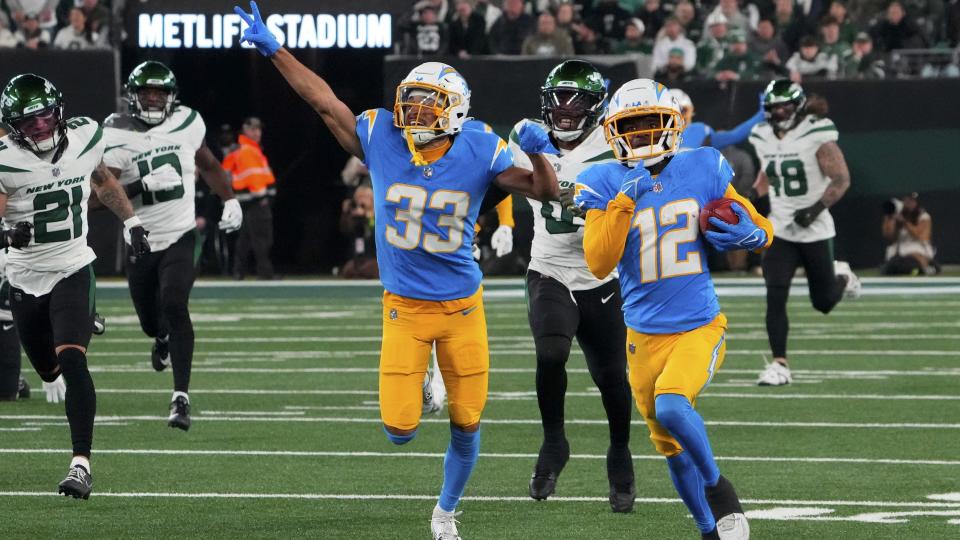 Nov 6, 2023; East Rutherford, New Jersey, USA; Los Angeles Chargers wide receiver Derius Davis (12) runs for a first half touchdown against the New York Jets at MetLife Stadium. Mandatory Credit: Robert Deutsch-USA TODAY Sports
