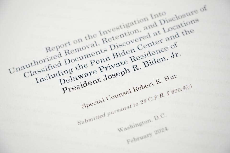 Detail photo of pages from Special Counsel Robert K. Hur report on the investigation into the removal and retention of classified documents by President Joe Biden at his home in Delaware and at the Penn Biden Center. The Justice Department notified President Joe Biden it wouldn’t pursue criminal charges for his handling of classified documents, which were found at his former office in Washington, D.C., and at his home in Delaware. The report said the president's document practices "present serious risks to national security," and that Biden presented himself "as a sympathetic, well-meaning, elderly man with a poor memory."