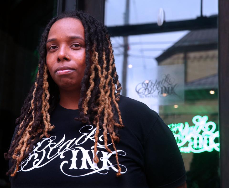 Tiara McGee of  Black Ink on Brady Street in Milwaukee. Black Ink tattoo shops became famous from the VH1 program Black Ink crew.