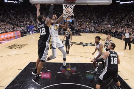 Nov 18, 2018; San Antonio, TX, USA; Golden State Warriors small forward Kevin Durant (35) shoots the ball as San Antonio Spurs power forward LaMarcus Aldridge (12) defends during the second half at AT&T Center. Mandatory Credit: Soobum Im-USA TODAY Sports