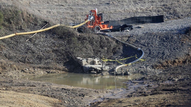 In this Jan. 14, 2016 file photo, a drainage pipe that was the original culprit of a coal ash spill that was one of the worst in U.S. history is seen at the Dan River Steam Station in Eden, N.C. 