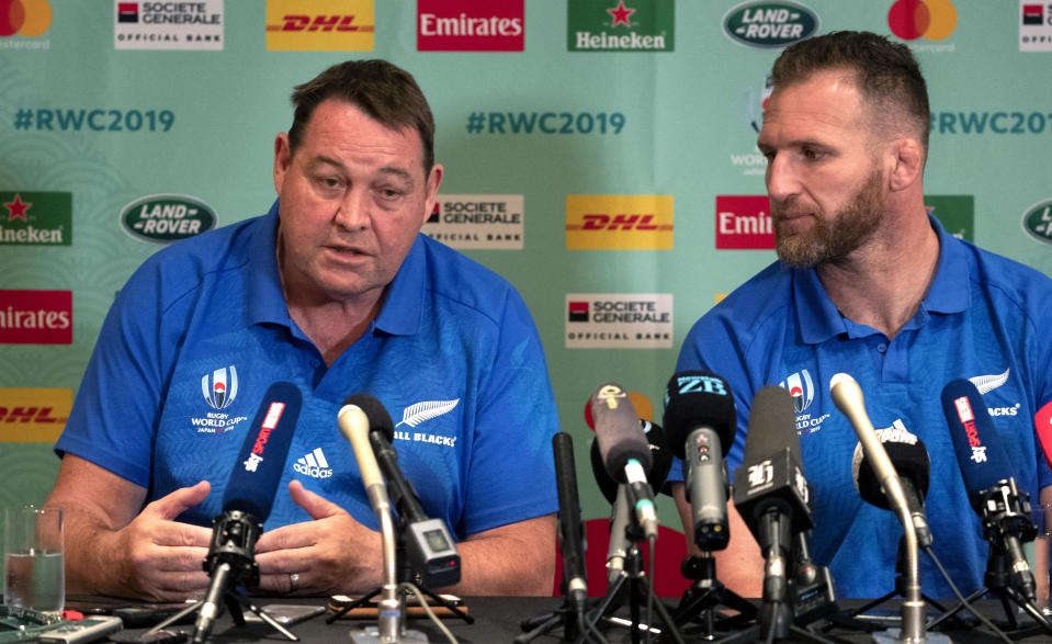 New Zealand All Blacks coach Steve Hansen and captain Kieran Read, right, address a press conference following the announcement of the cancellation of their Oct. 12 pool match match against Italy, in Tokyo, Japan, Thursday, Oct.10, 2019. Rugby World Cup organizers have had to cancel two games scheduled for Saturday because of concerns over the anticipated impact of Typhoon Hagibis. (Mark Mitchell/NZ Herald via AP)