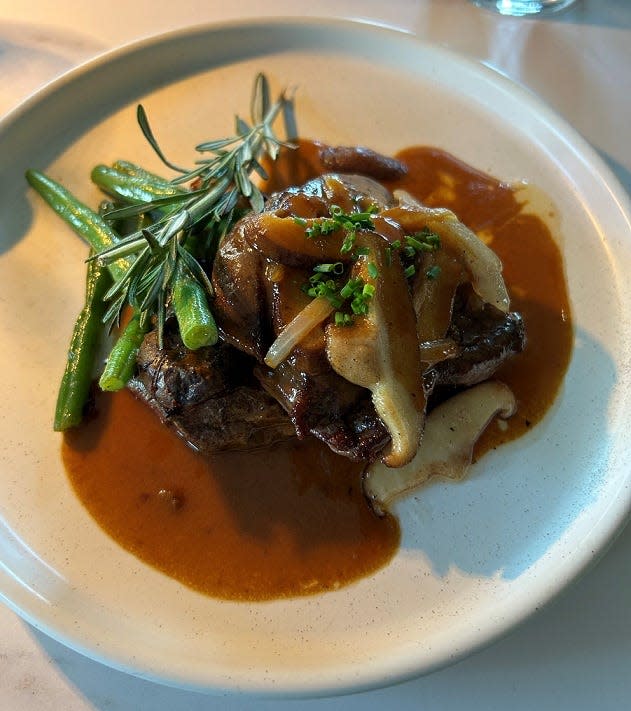 The Granville Inn has a refreshed menu for spring that includes a steak Diane, which includes filet medallions with shiitake mushrooms, haricort vert, crispy fingerling potatoes and crispy onions.